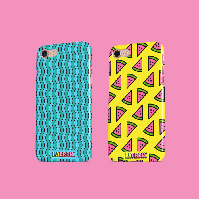 Two LaCroix phone cases. One is decorated with wavy blue stripes, the other is yellow with a pattern of simple watermelon icons.